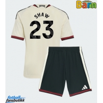 Manchester United Luke Shaw #23 Tredjedraktsett Barn 2026-27 Kortermet (+ Korte bukser)